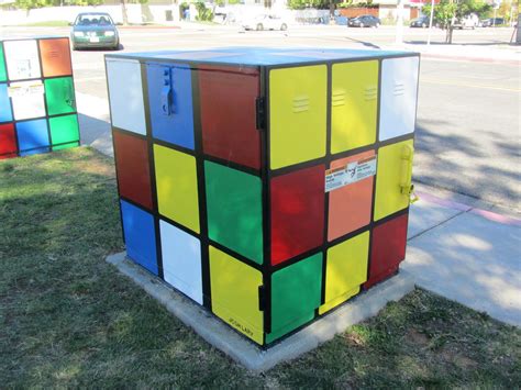 decoration near electric boxes|painting utility boxes in yard.